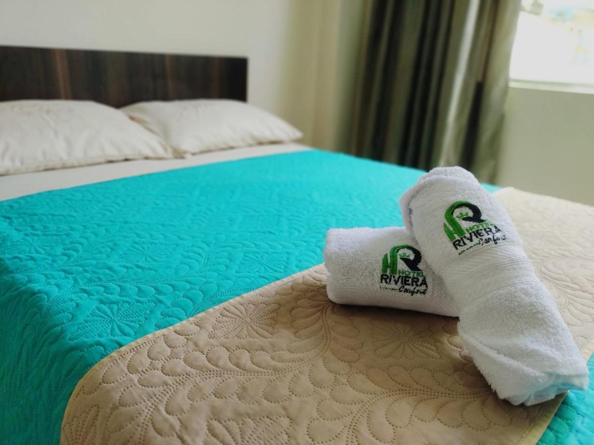Hotel Riviera Confort ปัสโต ภายนอก รูปภาพ