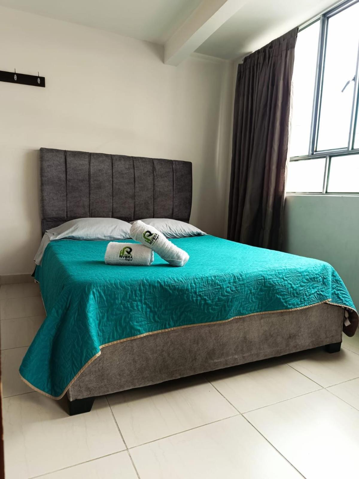 Hotel Riviera Confort ปัสโต ภายนอก รูปภาพ
