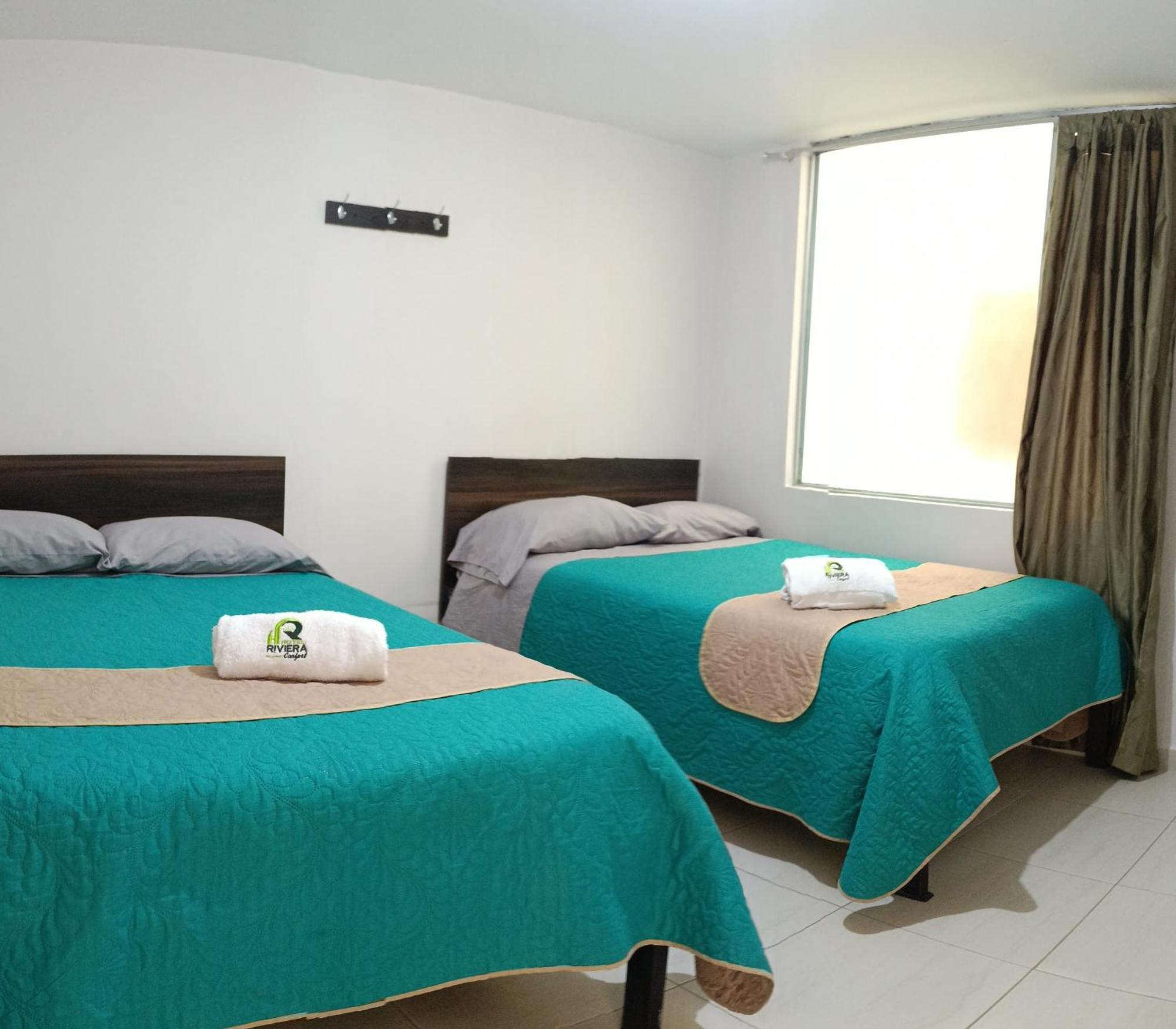 Hotel Riviera Confort ปัสโต ภายนอก รูปภาพ